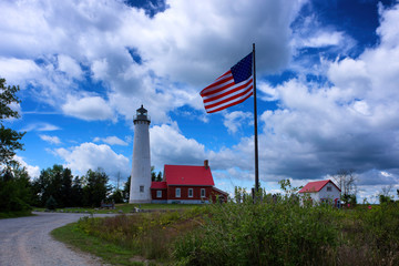 Tawas Point Lighthouse and American Flag