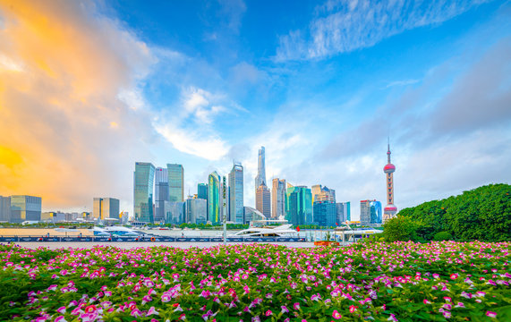 The morning of Lujiazui in Shanghai, China, with the prospect of flower beds