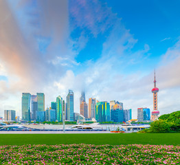 Fototapeta na wymiar The morning of Lujiazui in Shanghai, China, with the prospect of flower beds