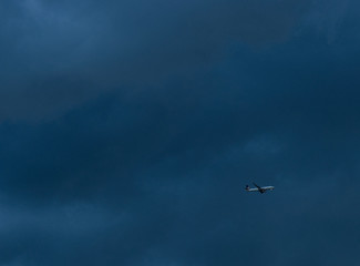 Plane flying from danger