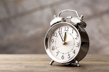 Retro alarm clock on   background