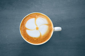 Cup of coffee on wooden table