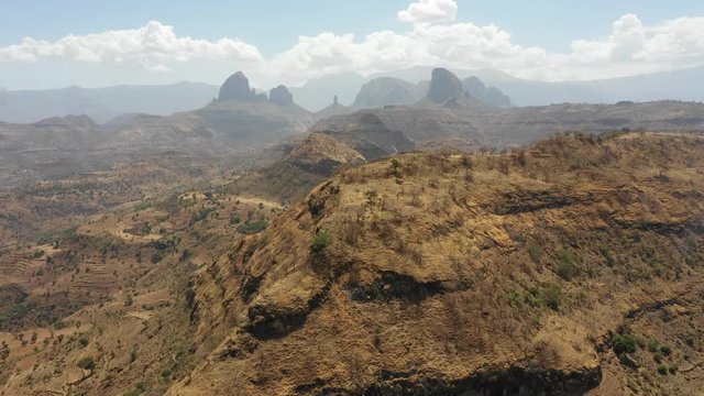 Flying over dry mountain ridge towards spectacular Simien national park, adventure travel and natural landscapes in Ethiopia Africa