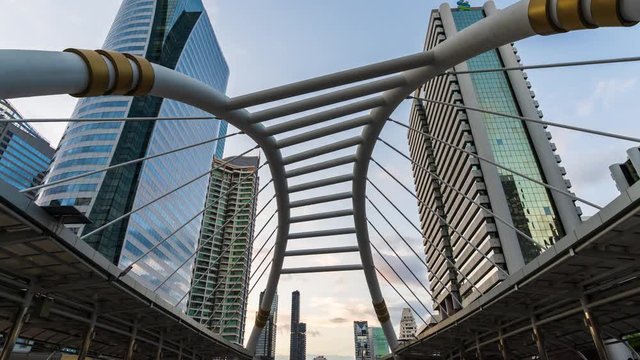 day to night time lapse of Chong Nonsi skytrain station in Bangkok,  Thailand