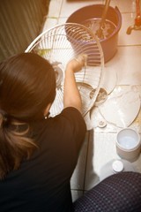Housewife use white cloth Wipe and clean the electric fan.