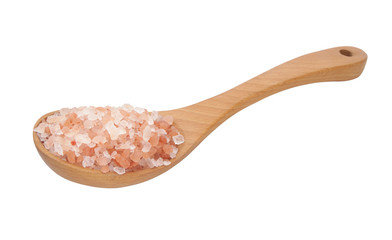 Fototapeta na wymiar Rock salt in wooden spoon isolated