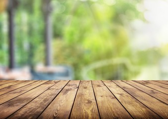 Worn wooden table and blur with bokeh background