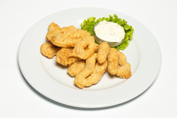 squid rings in a batter with salad