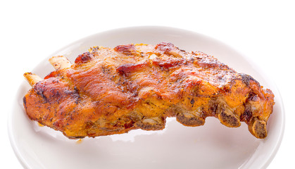 Pork bone with BBQ sauce an isolated