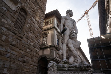 Sculpture Hercules and giant Cacus (1534) stands in front of Palazzo Vecchio. Florence. Italy.