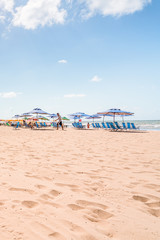 Recife, Boa Viagem Beach, Pernambuco, Brazil - June, 2019: Blue sky day at the beach early in the morning.