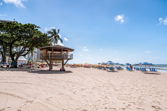 Recife, Boa Viagem Beach, Pernambuco, Brazil - June, 2019: Blue sky day at the beach early in the morning.