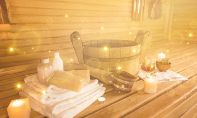 Interior of sauna and sauna accessories on background