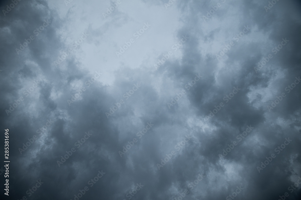 Wall mural abstract texture background of dark sky with storm clouds.