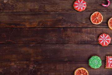 Christmas homemade gingerbread cookies on wooden table. It can be used as a background