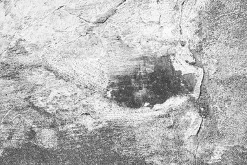 Texture of a concrete wall with cracks and scratches which can be used as a background