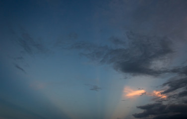 dramatic sky with clouds at sunset