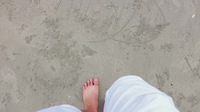 He is stepping into the sea.holiday concept.