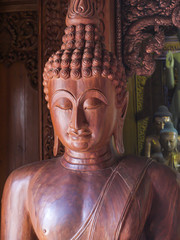 wood sculpture Buddha in Thai temple - 285385824