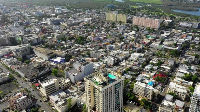 Downward tilt aerial 4k drone shot of the downtown Condado area in the Old San Juan city of Puerto Rico.