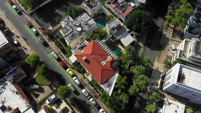 Decending tilt up 4k drone view of of the Condado section of Old San Juan, Puerto Rico.