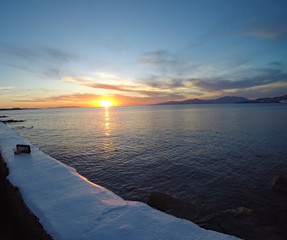 Mykonos sunset and cellphone filming it