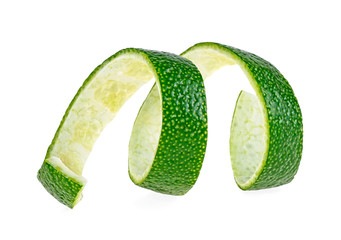 Lime fruit peel isolated on white background. Lime twist. Lime skin.