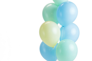 Large bunch of colorful balloons on white background. Isolated, close up.