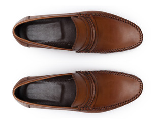 Classic male leather shoes isolated on a white, top view.