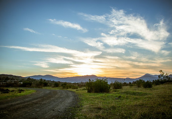 landscape with road and clouds