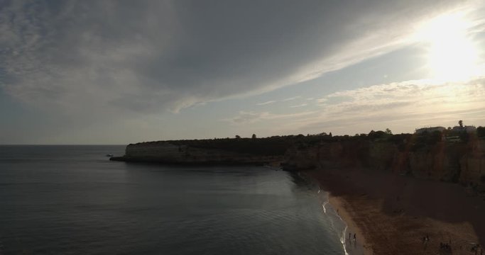 Seascape timelapse view of Ermida Senhora da Rocha and beach, in the south coast of Algarve tourist region, Portugal.