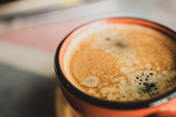 close up cup of coffee espresso on table background