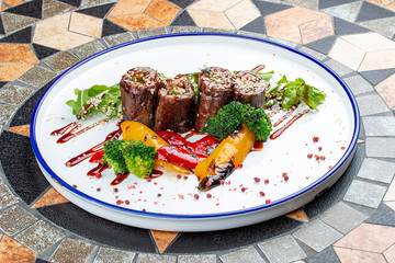Veal rolls with foie gras and grilled vegetables