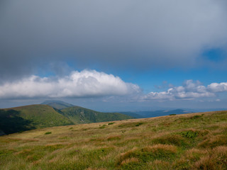 Mountain valley during sunrise / sunset. Natural summer landscape. Colorful summer landscape in the Carpathian mountains.