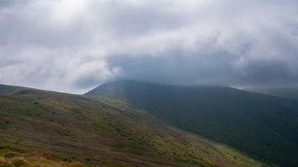 Mountain valley during sunrise / sunset. Natural summer landscape. Colorful summer landscape in the Carpathian mountains.