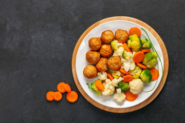 Meatballs with broccoli and a cauliflower