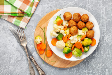 Meatballs with broccoli and a cauliflower