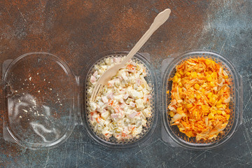 Two salads - Russian salad olivier and carrot salad