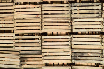 Wooden boxes stacked together. Warehouse empty wooden containers