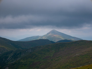 Fototapeta premium Mountain valley during sunrise / sunset. Natural summer landscape. Colorful summer landscape in the Carpathian mountains.