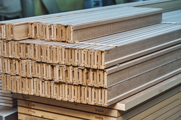 Joinery. Wood door manufacturing process. Stacked door architraves. Furniture manufacture.