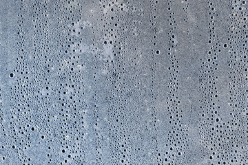 Background of the condensate drops on the film is polyethylene. Water drops texture