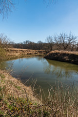 Fototapeta na wymiar meandering Odra river in early spring CHKO Poodri in Czech republic