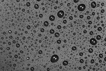 abstract water drops on a dark black  background