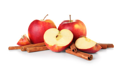 Fresh apple with cinnamon on white background