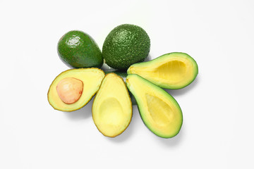Ripe avocados on white background