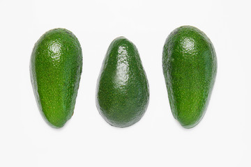 Ripe avocados on white background