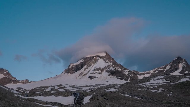 Time lapse of Cloud movement over the European Alps. Gran paradiso national park. Zoom out. 4K