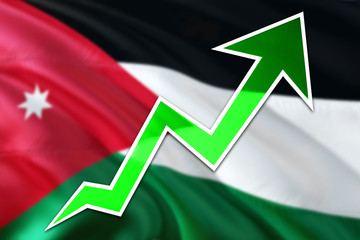 Jordan economy graph is indicating positive growth, green arrow going up with trend line. Business concept on national background.