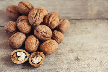 Walnuts on the table close-up. Top view. Copy, empty space for text